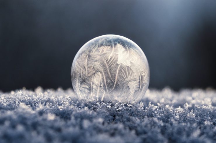 Close-up photo of a frozen dew drop