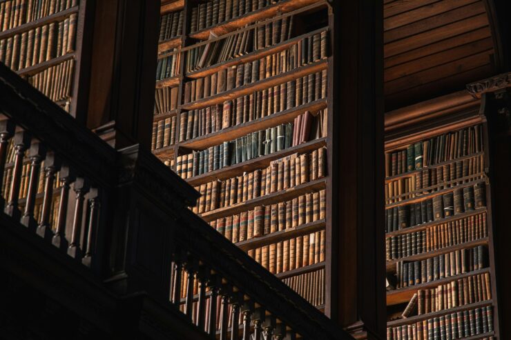Photo of tall bookshelves in the Trinity College library