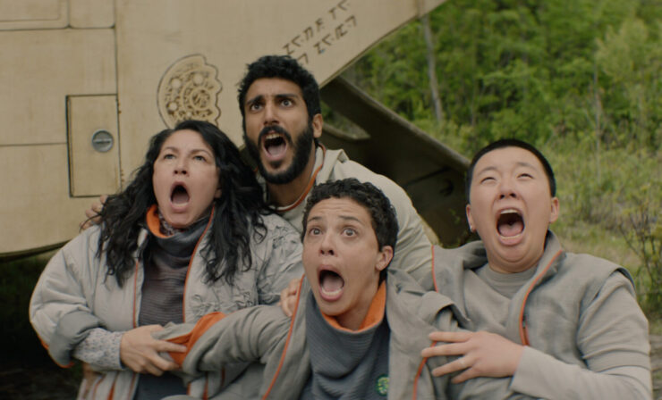 Bharadwaj, Ratthi, Pin-Lee, and Arada in a huddle, screaming