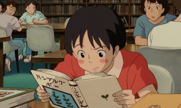 Image from the animated film Whisper of the Heart: Shizuku reads in a library